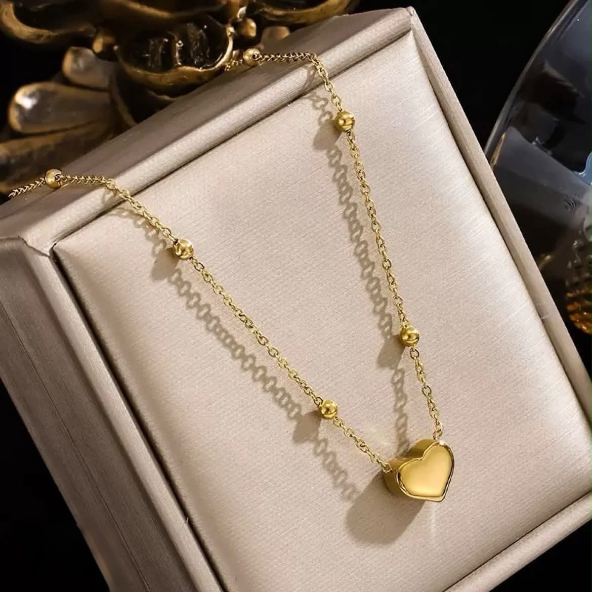 Golden pendent with locket