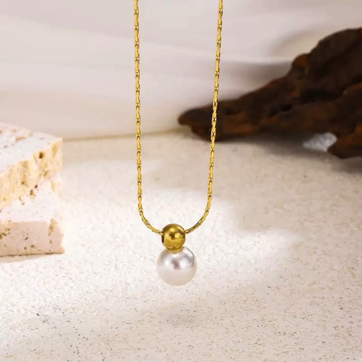 Golden pendent with locket