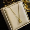 Golden pendent with locket