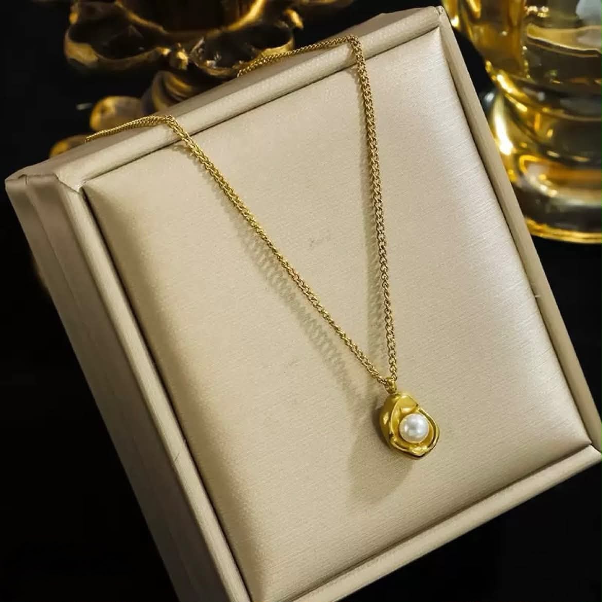 Golden pendent with locket