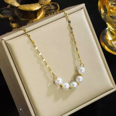 Golden pendent with locket