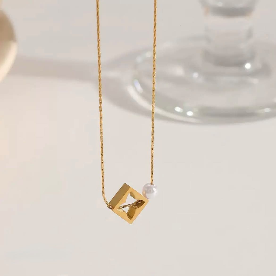 Golden pendent with locket