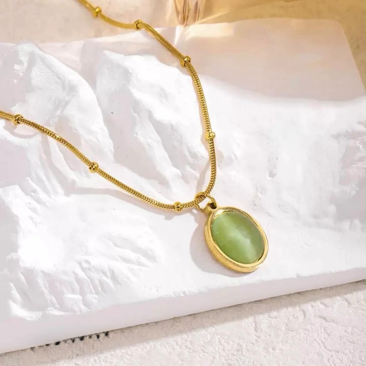 Golden pendent with locket