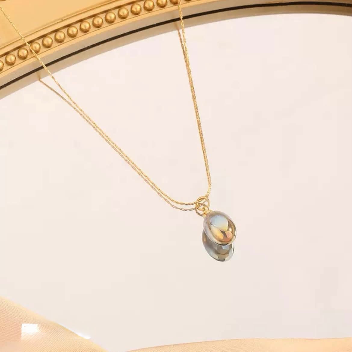 Golden pendent with locket