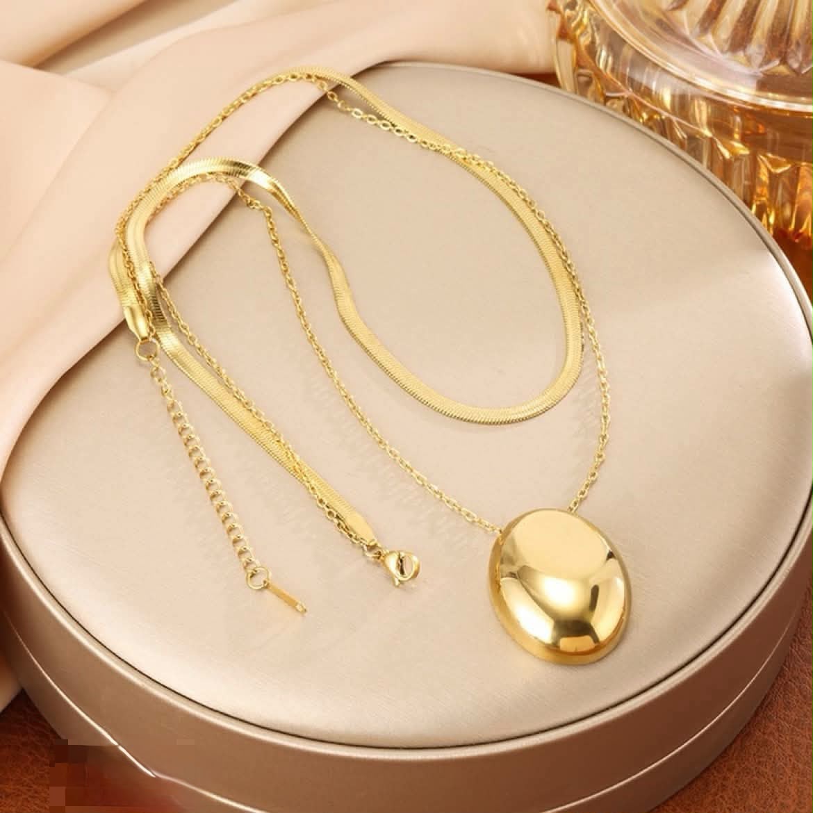 Golden pendent with locket