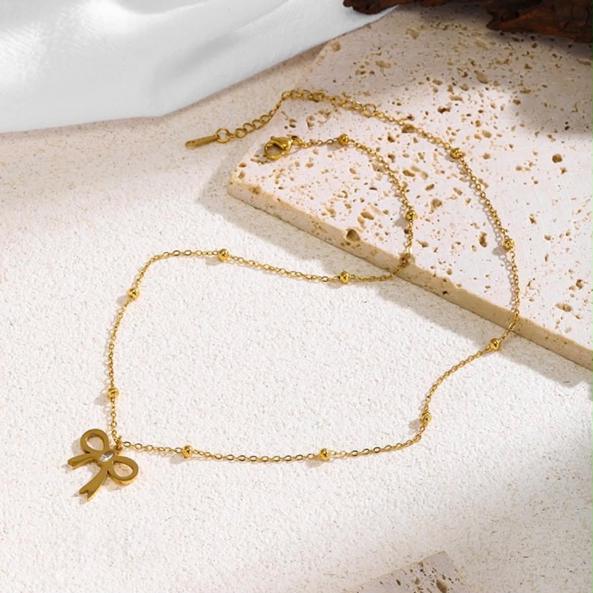 Golden pendent with locket