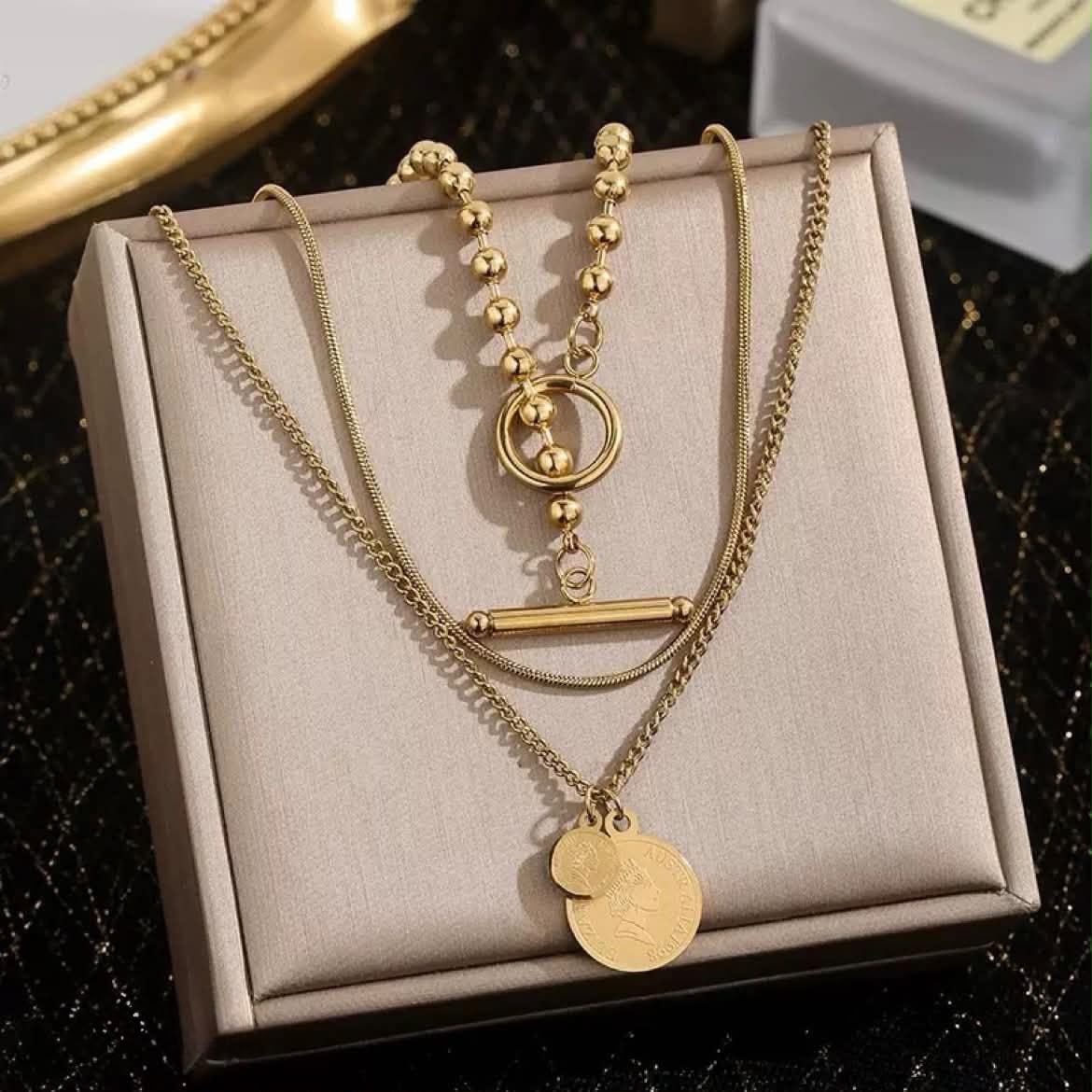Golden pendent with locket