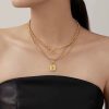 Golden pendent with locket and chain