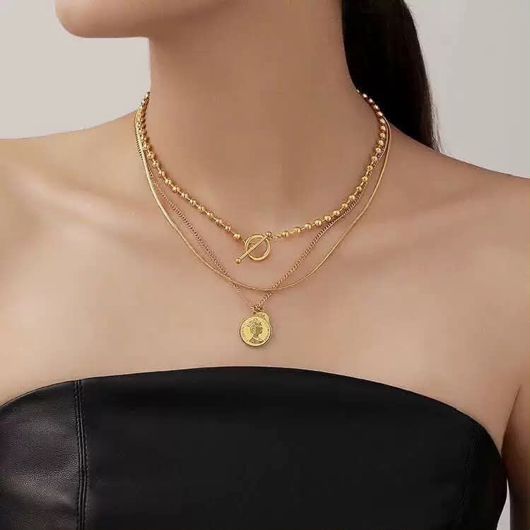 Golden pendent with locket and chain