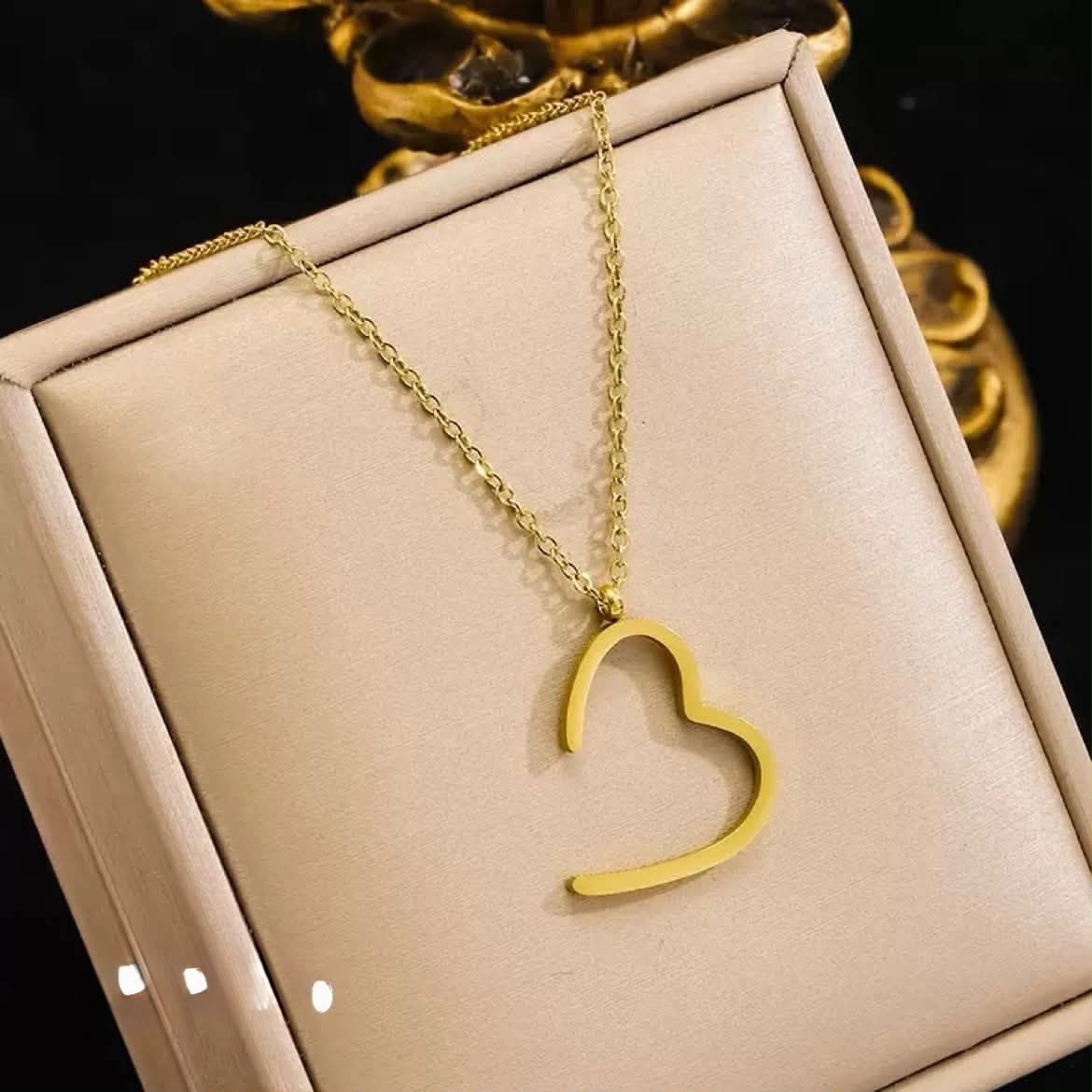 Golden pendent with locket