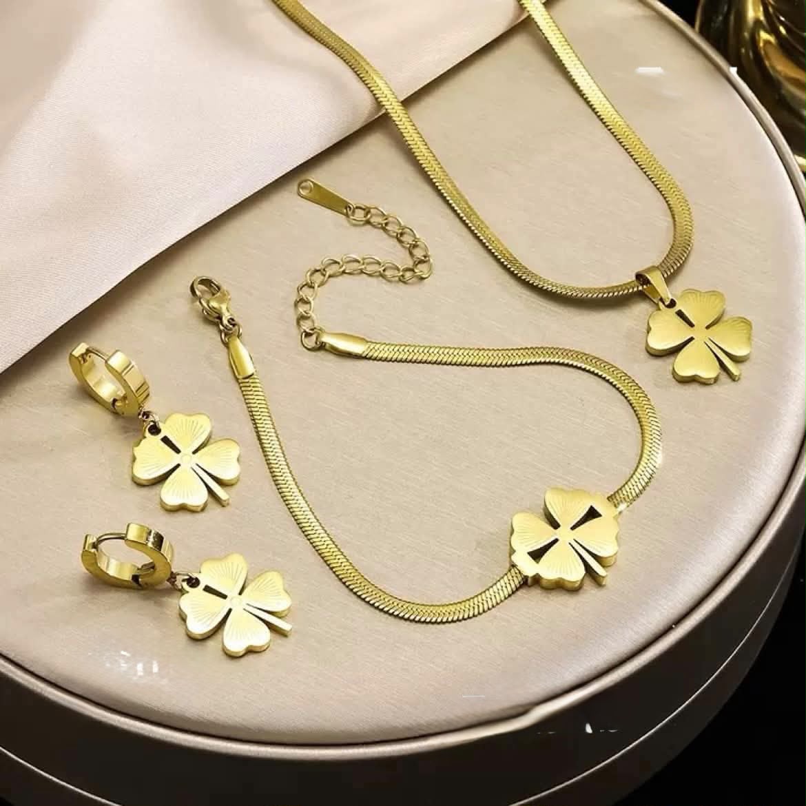 Golden pendent with locket and earring set