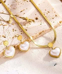 Golden earring , chain and locket set