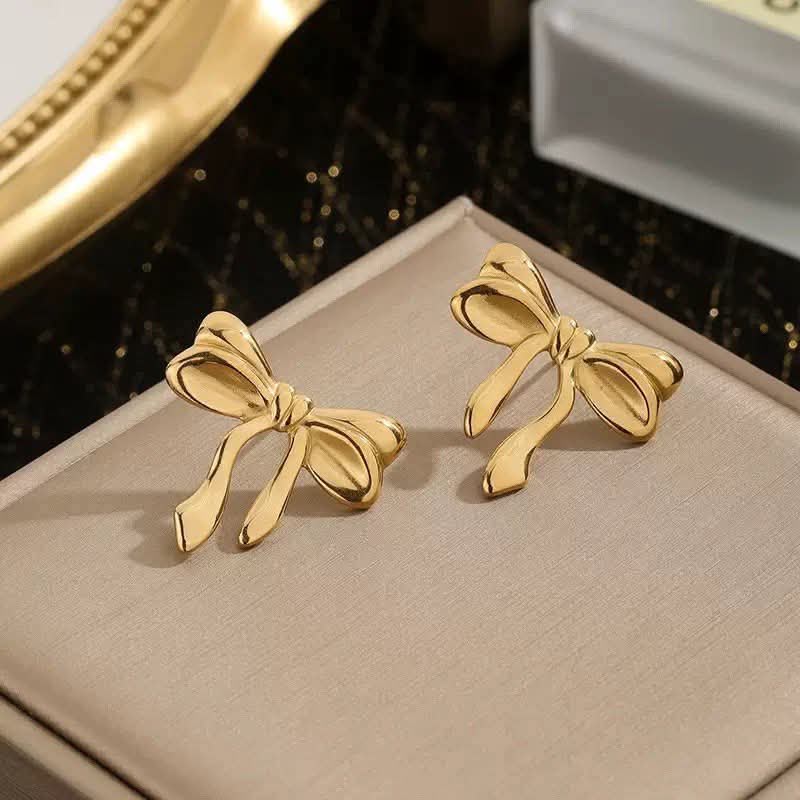 Golden earring ribbon design