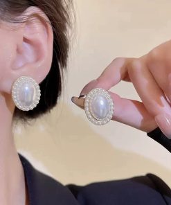 white pearl earring